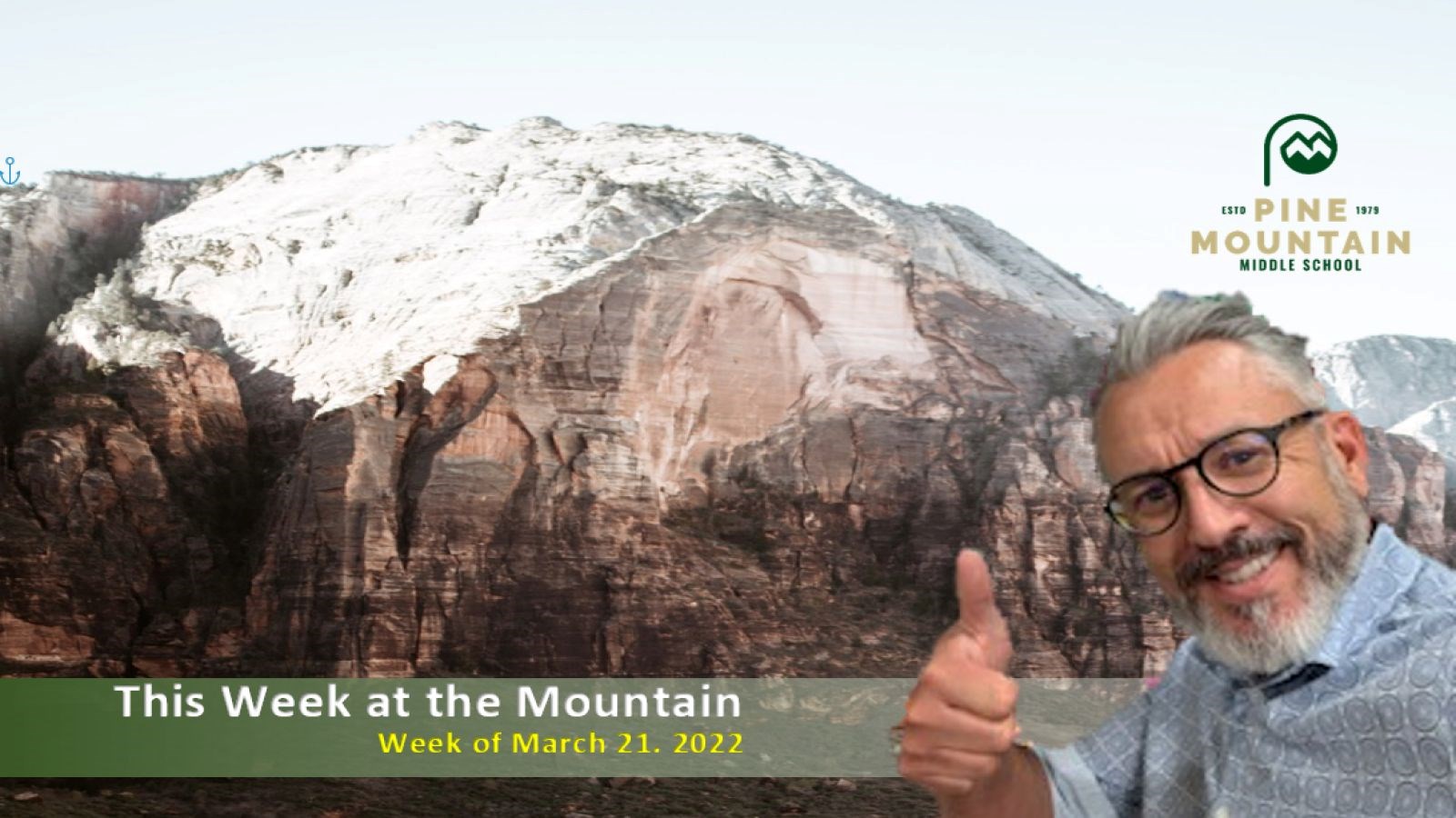 Principal in front of Mountain Background